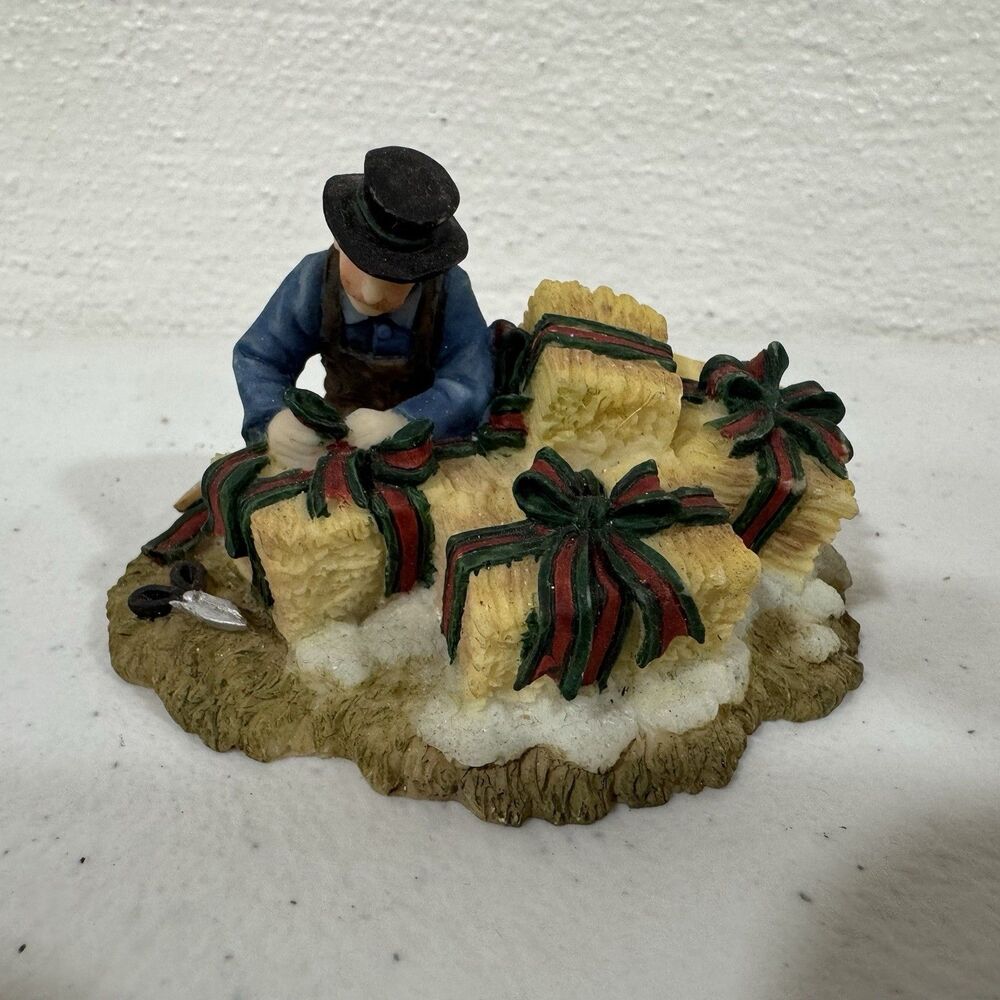 O'Well Christmas Village Figurine Man Wrapping Presents with Hay Bales
